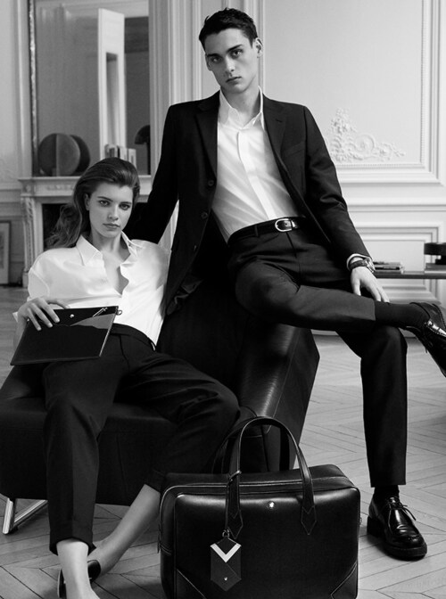 Models sitting on a lounge with leather products