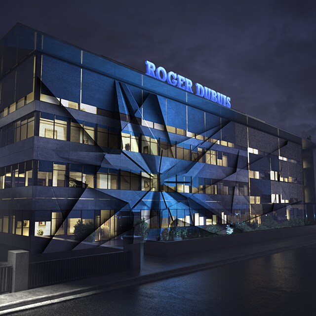 Roger Dubuis office at night with lights on